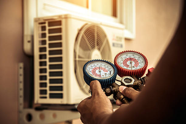 Professional Heat Pump Repair technician working in Mason, OH